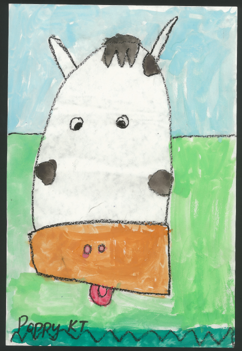 student artwork of a cow's face with a green grass and blue sky background.  