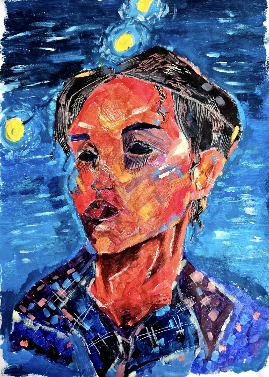 Student self portrait artwork inspired by the cubist style.  Artwork has a blue background with student face with dark hair and dark eyes