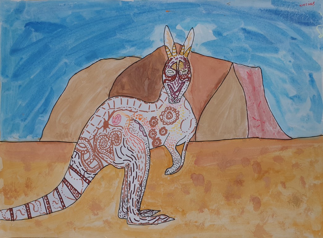 Painting of a kangaroo standing in front of Uluru under a blue sky.  The kangaroo is adorned with Aboriginal symbols.