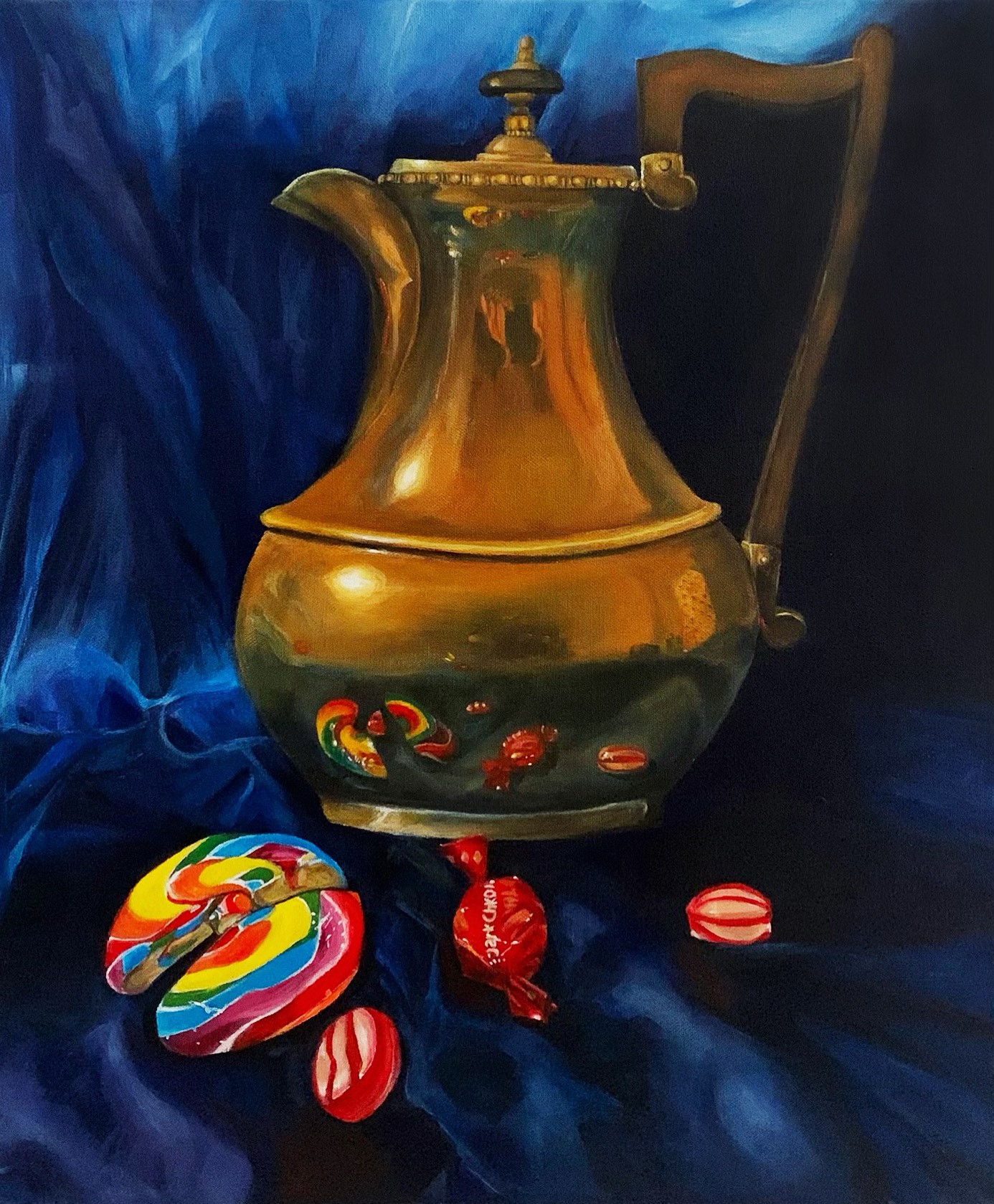 A golden teapot and candy on a blue background, creating a vibrant and enticing painting.
