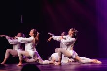 James Fallon High School Senior Dancers in kneeling pose wearing white outfits 
