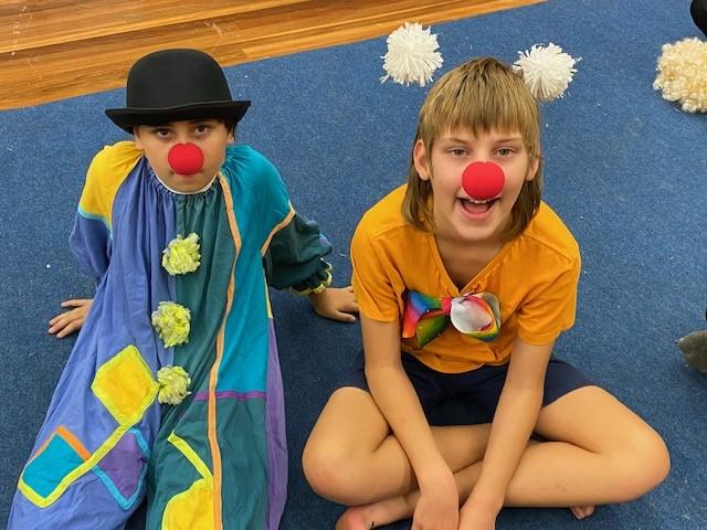 2 boys dressed as clowns
