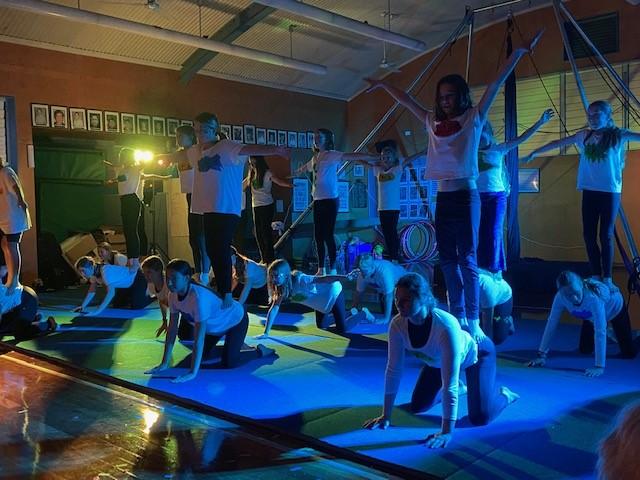 students performing a circus routine at camp showcase