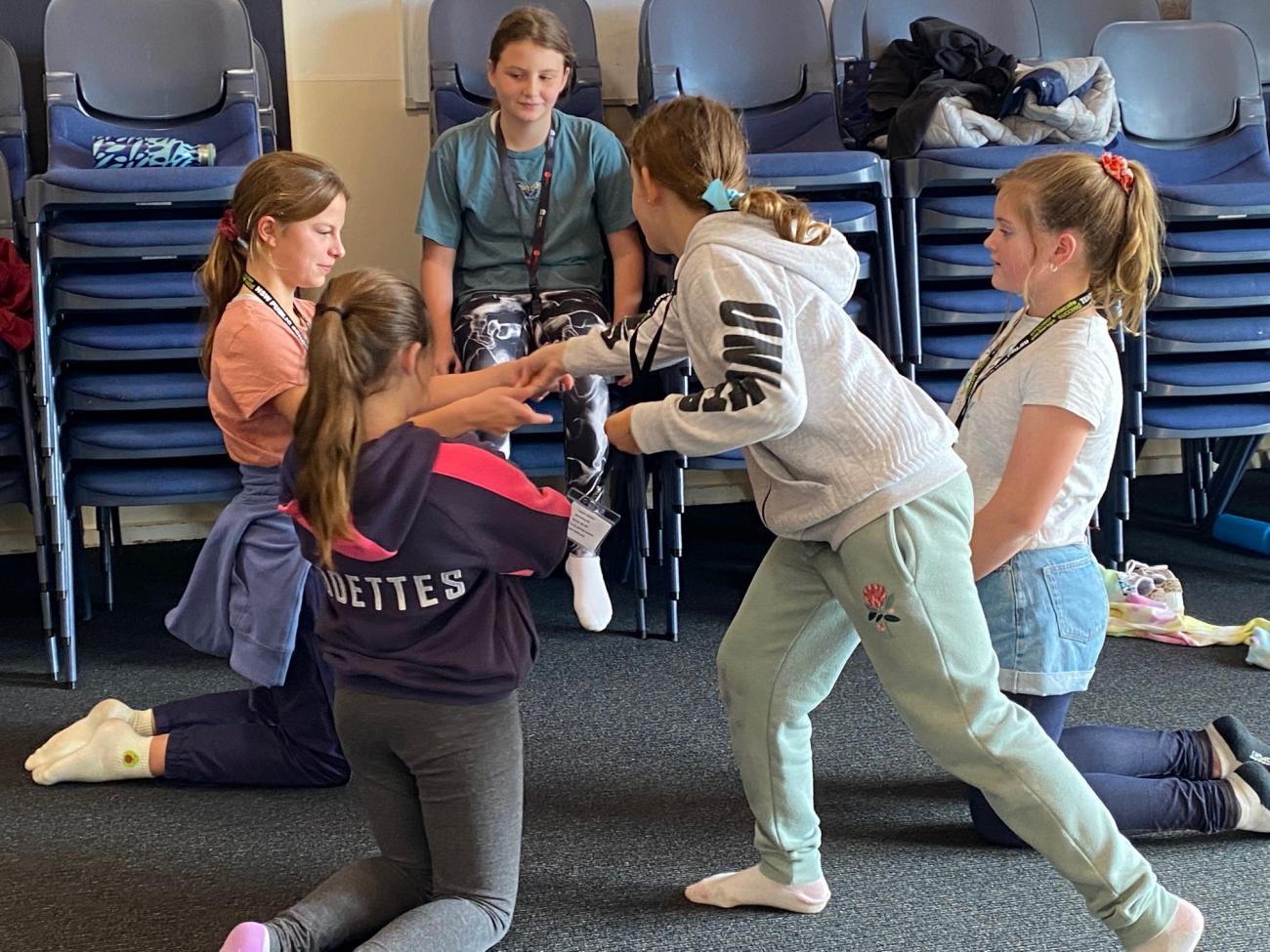 group of students working together on a drama tableau