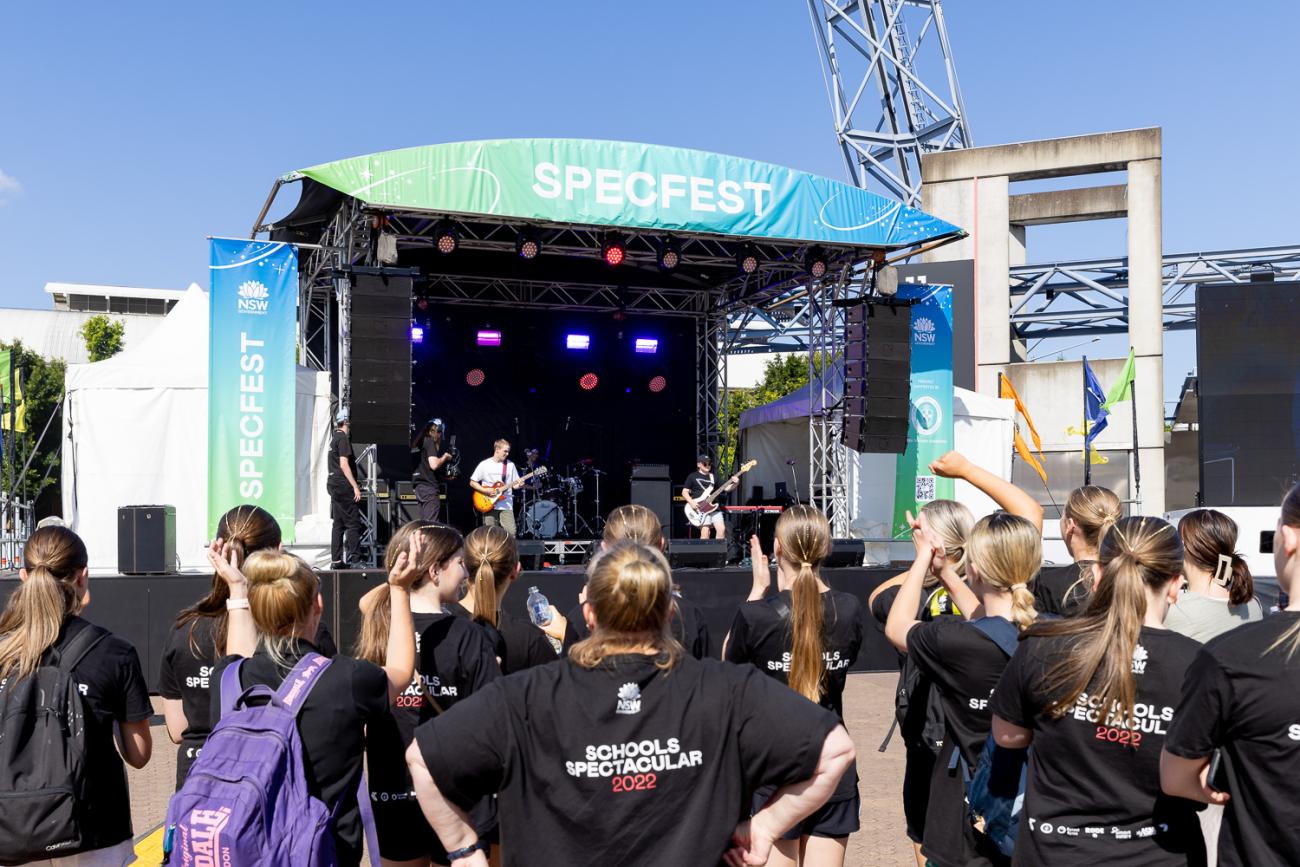 Students performing on a festival stage