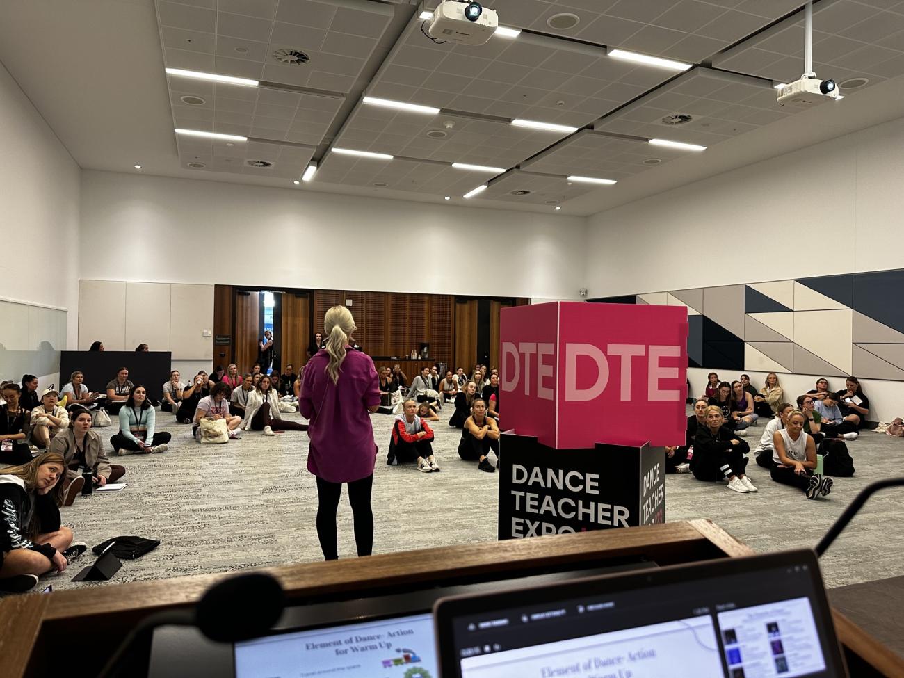 Dance tutor presenting a workshop to teachers