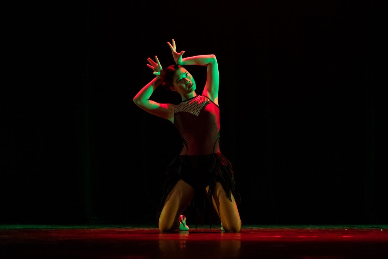 Female dancer in red and black costume