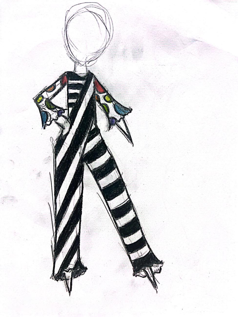 An illustration of a full-bodied outfit of layers of black and white stripes, with colourful large-spotted sleeves.