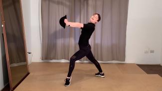 Kira Nelson demonstrating a movement from a Jazz dance routine
