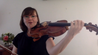 Nicole Forsyth holding a viola