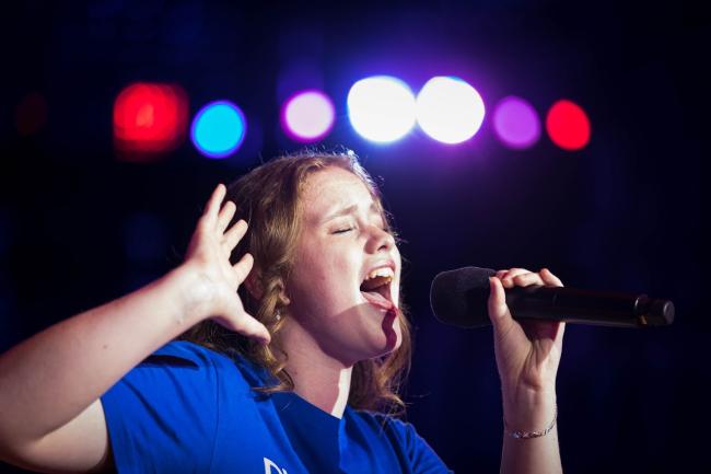 A young person singing