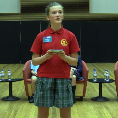 student speaking during competition