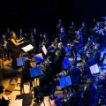 SNPS Symphonic Band performs onstage at the Sydney Opera House