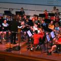 Primary Wind Ensemble performing on stage